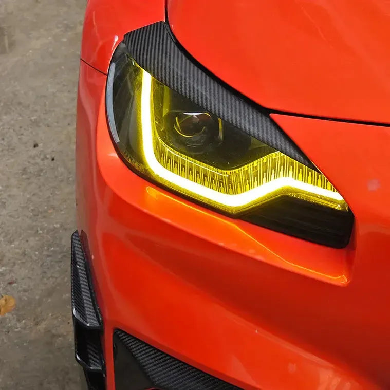 Carbon Fiber Headlight Trim Set - BMW G87 M2 & G42 2 Series